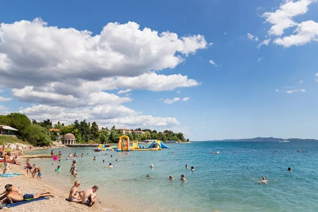 Bouncy castle in the sea at Kolovare beach in Zadar, Croatia (48670415427)